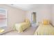 Bedroom with two twin beds and a window at 1926 Regency Cove Ct, Atlanta, GA 30341