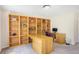 Bright home office featuring built-in shelves and a workspace at 1926 Regency Cove Ct, Atlanta, GA 30341