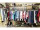 Organized walk-in closet with shelves, hanging rods, and storage bins at 1926 Regency Cove Ct, Atlanta, GA 30341