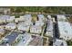 A neighborhood featuring townhomes with private outdoor spaces and manicured landscaping at 204 N Esplanade, Alpharetta, GA 30009