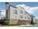 Charming home with stone and siding, attached garage, and beautiful landscaping at 204 N Esplanade, Alpharetta, GA 30009