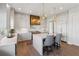 Gourmet kitchen with marble countertops, a bronze hood, and modern appliances at 204 N Esplanade, Alpharetta, GA 30009