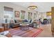 Bright living room with an open layout, recessed lights, and a view to the kitchen and dining areas at 204 N Esplanade, Alpharetta, GA 30009