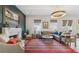 Comfortable living room boasts a fireplace, stylish decor, and an open layout for entertaining at 204 N Esplanade, Alpharetta, GA 30009