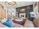 Inviting living room with a fireplace and stylish decor, creating a cozy atmosphere at 204 N Esplanade, Alpharetta, GA 30009