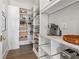 Organized pantry featuring ample shelving and storage solutions for efficient kitchen organization at 204 N Esplanade, Alpharetta, GA 30009