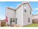 A fenced backyard with patio and grassy area provides a cozy outdoor space at 3200 Baylor Cir, Mcdonough, GA 30253