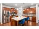 Updated kitchen with stainless steel appliances, granite countertops, and stylish cabinetry at 3200 Baylor Cir, Mcdonough, GA 30253