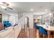 Open living area showcasing wood floors, blue accents, and stairs at 3200 Baylor Cir, Mcdonough, GA 30253