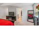 Well-appointed main bedroom with walk-in closet, dresser, TV, and spacious layout for relaxing at 3200 Baylor Cir, Mcdonough, GA 30253