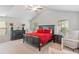 Relaxing main bedroom features a king bed, matching dressers, side tables, and two sitting chairs at 3200 Baylor Cir, Mcdonough, GA 30253