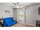 Cozy playroom features natural lighting, plush blue seating, and fun decor perfect for children at 3200 Baylor Cir, Mcdonough, GA 30253