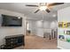 Spacious upstairs hallway with neutral decor, ceiling fan, and easy access to bedrooms and living spaces at 3200 Baylor Cir, Mcdonough, GA 30253