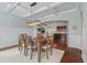 Open concept dining room with an archway view of the kitchen with wood floors at 4225 Hopewell Manor Dr, Cumming, GA 30028
