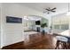 Bright living space with wood floors, a fireplace, and ample natural light at 4225 Hopewell Manor Dr, Cumming, GA 30028
