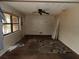 A view of the living room featuring a ceiling fan and window at 4269 Mercer Rd, Decatur, GA 30035