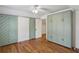 Bedroom featuring barn doors, and custom built-in storage at 2621 White Oak Dr, Decatur, GA 30032