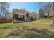 Beautiful home exterior with well-manicured lawn, mature trees and a lovely entryway at 2621 White Oak Dr, Decatur, GA 30032