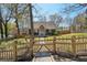Charming home with a picket fence and well-maintained front yard with mature trees at 2621 White Oak Dr, Decatur, GA 30032