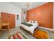 Stylish bedroom with colorful rug, and a decorative light fixture at 89 Mangum Sw St # 119, Atlanta, GA 30313