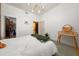 Bright bedroom with a view of a walk-in closet and modern light fixture at 89 Mangum Sw St # 119, Atlanta, GA 30313