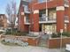 Close up view of Centennial Station entrance with attractive landscaping and stairs at 89 Mangum Sw St # 119, Atlanta, GA 30313