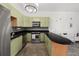 Stylish kitchen with stainless steel appliances, sleek countertops, and modern cabinetry at 89 Mangum Sw St # 119, Atlanta, GA 30313