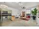 Open-concept living space with sleek kitchen, stylish decor, and ample natural light at 89 Mangum Sw St # 119, Atlanta, GA 30313