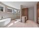 Spacious bathroom featuring a modern tub, a glass-enclosed shower, and contemporary finishes at 96 The Prado Ne, Atlanta, GA 30309