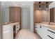 Elegant bathroom featuring double vanities, contemporary fixtures, and ample cabinet space at 96 The Prado Ne, Atlanta, GA 30309