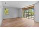Bedroom featuring large windows, hardwood floors, and neutral decor at 96 The Prado Ne, Atlanta, GA 30309
