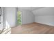 Bright bedroom with hardwood floors, natural light, and a curved wall feature at 96 The Prado Ne, Atlanta, GA 30309