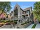 Elegant home with landscaped front yard, driveway, and grand staircase at 96 The Prado Ne, Atlanta, GA 30309
