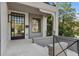 Inviting home entrance featuring modern architecture, a gray stone porch and manicured landscaping at 96 The Prado Ne, Atlanta, GA 30309