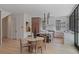 Modern kitchen and dining area with large windows and sleek black framed windows at 96 The Prado Ne, Atlanta, GA 30309