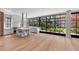 Spacious kitchen featuring marble counters, modern fixtures, chef's range and walls of windows at 96 The Prado Ne, Atlanta, GA 30309