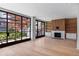 Bright, open living room with hardwood floors, fireplace and large windows at 96 The Prado Ne, Atlanta, GA 30309