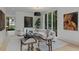 Elegant living room with large windows, modern lighting, and stylish furniture at 96 The Prado Ne, Atlanta, GA 30309
