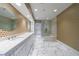 Well-lit bathroom features dual sinks and a glass-enclosed shower at 3286 Northside Nw Pkwy # 1007, Atlanta, GA 30327