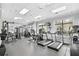 Well-equipped gym with modern machines and bright windows overlooking the pool at 3286 Northside Nw Pkwy # 1007, Atlanta, GA 30327