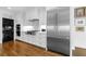 Contemporary kitchen features stainless steel appliances, stylish cabinetry, and modern fixtures at 3286 Northside Nw Pkwy # 1007, Atlanta, GA 30327