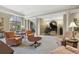 Elegant resident lounge featuring comfortable seating, a grand piano, and stylish decor at 3286 Northside Nw Pkwy # 1007, Atlanta, GA 30327