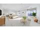Spacious main bedroom boasts neutral tones and comfortable seating area at 3286 Northside Nw Pkwy # 1007, Atlanta, GA 30327