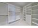 Spacious walk-in closet with ample shelving and hanging space at 3286 Northside Nw Pkwy # 1007, Atlanta, GA 30327