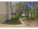 View of backyard featuring a deck overlooking a spacious lot with mature trees at 3635 Spring Mesa Dr, Snellville, GA 30039