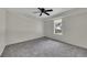 Bright bedroom featuring carpet floors, a modern ceiling fan and natural light at 3635 Spring Mesa Dr, Snellville, GA 30039