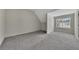 Bonus room with neutral carpet, natural light and space for multiple uses at 3635 Spring Mesa Dr, Snellville, GA 30039