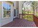 Inviting deck with access to the home, offering views of a lush, green landscape at 3635 Spring Mesa Dr, Snellville, GA 30039