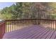 Private deck overlooking a serene, wooded backyard, perfect for outdoor entertaining at 3635 Spring Mesa Dr, Snellville, GA 30039