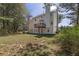 Back of home showing the deck and large backyard at 3635 Spring Mesa Dr, Snellville, GA 30039